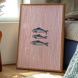 Striped sardines printable wall art displayed in a modern coastal kitchen setting