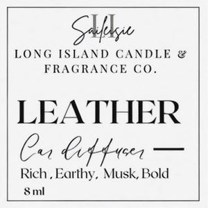 May include: A white label with black text that reads "Sanfeksie Long Island Candle & Fragrance Co. LEATHER Car Diffuser - Rich, Earthy, Musk, Bold 8 ml"