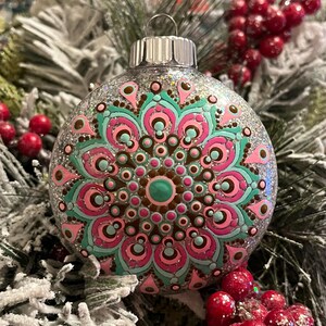 Hand painted 3 inch round brown, pink and green “sun” Mandala Christmas ornament