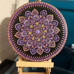 Purple and gold “sun” mandala/dot painting