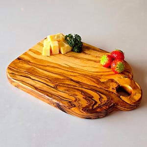 Handcrafted Olive Wood Cutting Board with Handle: Cheese & Charcuterie Serving