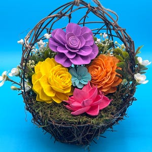 Vibrant Sola Wood Flower Arrangement in Rustic Hanging Basket
