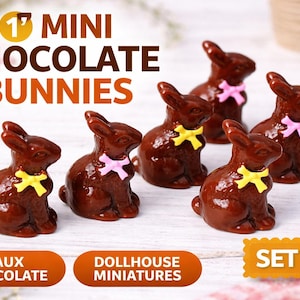 May include: Six miniature chocolate bunny figurines with pink and yellow bow ties. The image includes text that reads "1" MINI CHOCOLATE BUNNIES", "FAUX CHOCOLATE", "DOLLHOUSE MINIATURES", and "SET OF 6".