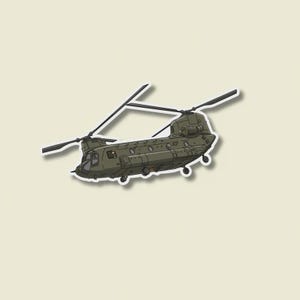 Pode incluir: Uma ilustração em estilo cartoon de um helicóptero militar de rotor tandem em verde-oliva. A aeronave apresenta dois conjuntos de pás de rotor, uma fuselagem longa com várias janelas circulares, um cockpit e rodas de trem de pouso com borda branca.