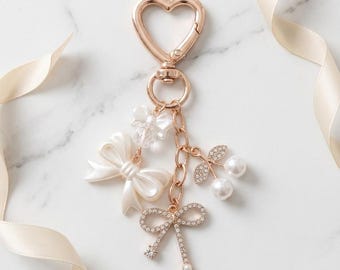 Luxury Coquette Bow Pearl Charm for Bag, Backpack, Purse – Elegant Diamond Cherry Keychain Accessory