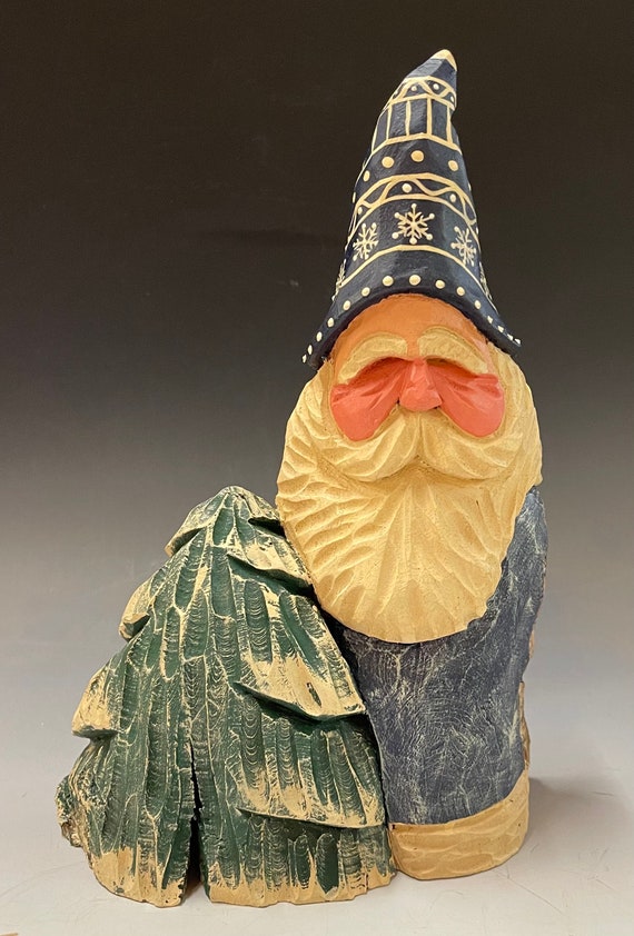 HAND carved 9.5” tall blue Santa w/ tree from 100 year old Cottonwood Bark.