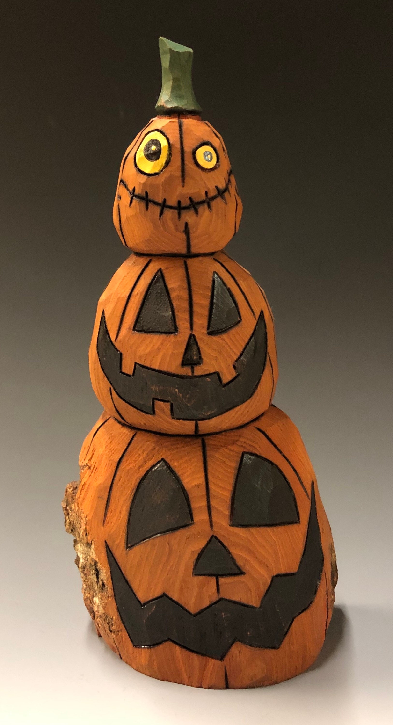 Tall Jack O Lantern
 HAND CARVED original 8” tall Jack O Lantern stack from 100 year old