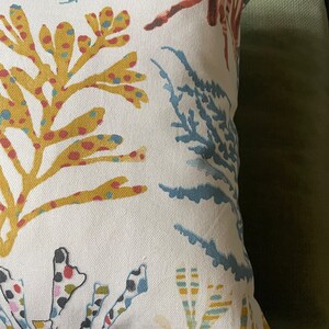 Colourful coral blue green red yellow olive cushion image 6