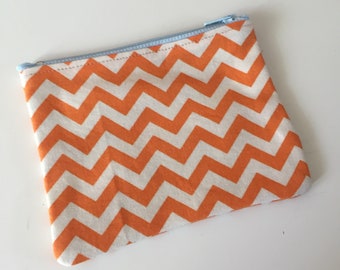 Orange and white chevron coin purse