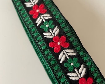 Green red and white floral woven ribbon