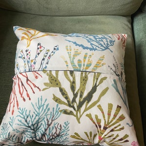 Colourful coral blue green red yellow olive cushion image 4