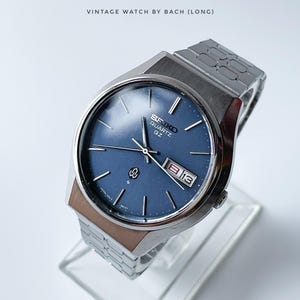 笹 Seiko QZ 0923-8000 Quartz Silver Sunburst Dial