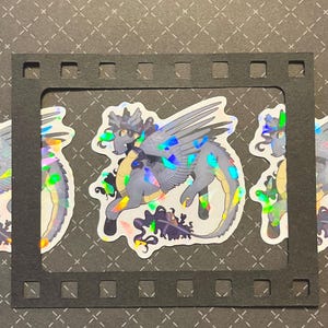 Geflügelte Bestie Holographischer Sticker