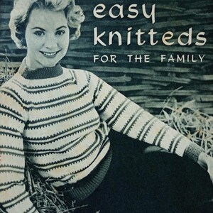 May include: A woman wearing a striped jumper sits in a field of hay. The magazine cover text reads "Woman easy knits for the family".