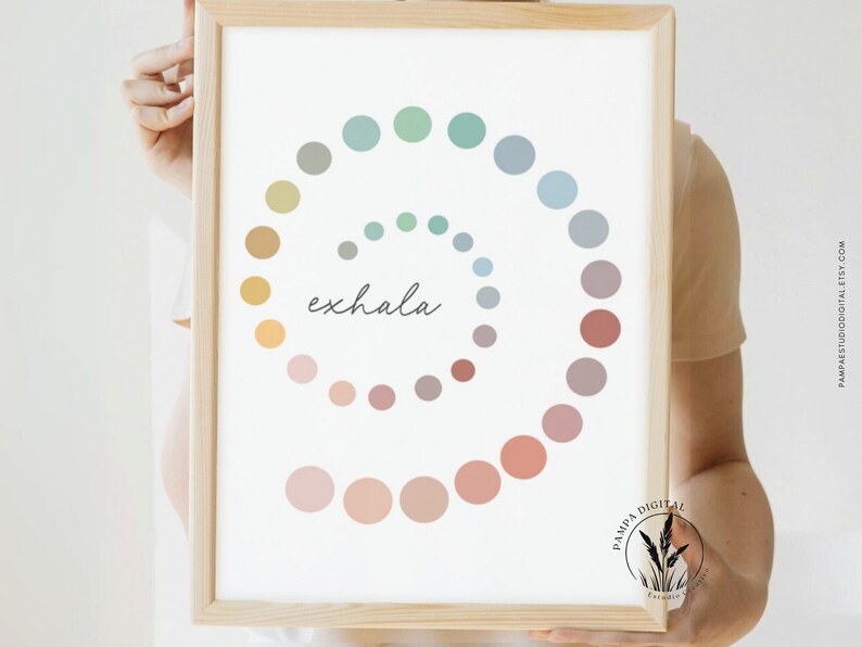May include: A printable wall art print with a spiral of colorful circles and the word "exhale" in the center. The colors are muted and pastel, including shades of green, blue, yellow, pink, and brown.