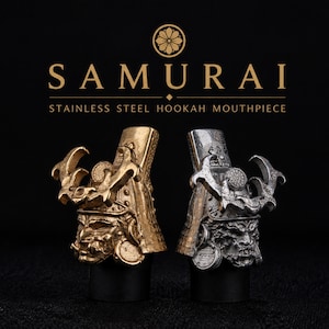 May include: Two stainless steel hookah mouthpieces shaped like samurai helmets, one in a gold finish and one in a silver finish. The text SAMURAI STAINLESS STEEL HOOKAH MOUTHPIECE is displayed above the two items against a black background.