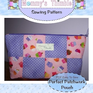 May include: A sewing pattern for a patchwork pouch. The pouch is made of pink and purple fabric with a cupcake and polka dot pattern. The finished size is 11 by 6 by 2 inches.