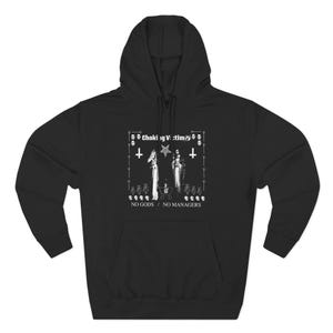 May include: Black hooded sweatshirt with a white graphic featuring the text "Choking Victim" and the words "NO GODS / NO MANAGERS". The graphic includes two figures, crosses, and other symbols.