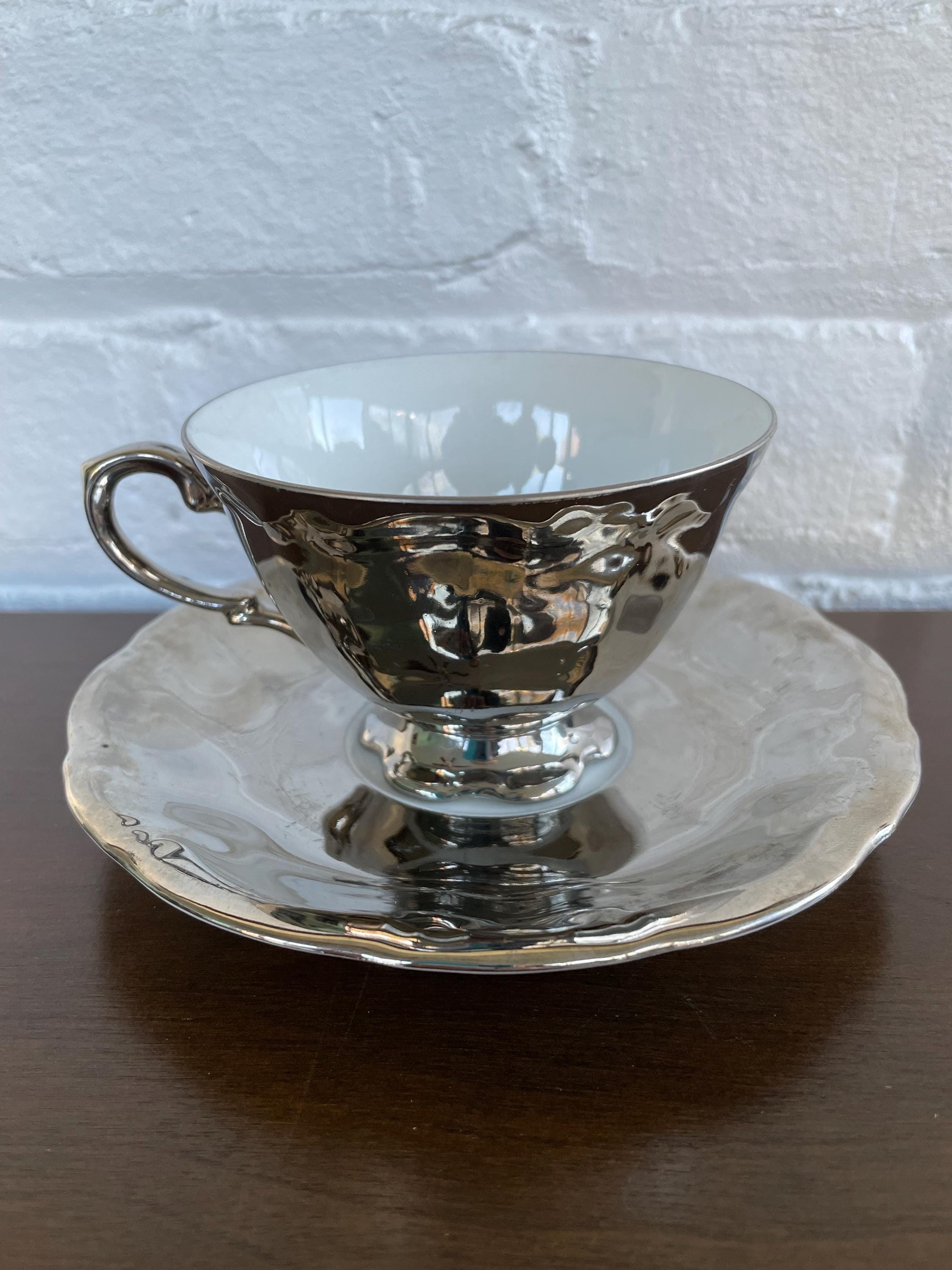 J Kronester Bavaria Tea Cup and Saucer in Brilliant Silver