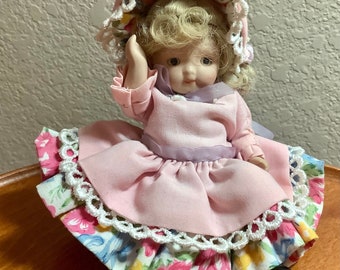 Vintage Porcelain Doll in Pink Dress | 6” tall | Jointed doll in Great Condition as pictured