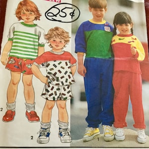 May include: Vintage sewing pattern featuring children's clothing designs. The pattern includes illustrations of children wearing colorful outfits, including striped shirts, shorts, and matching pants sets. The price is marked as 25 cents.