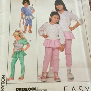 Simplicity 9272 | Childs Pull On Pants with attached skirt in 2 lengths | Pull over top | Stretch Knits only | uncut |  Breast 22-25.5