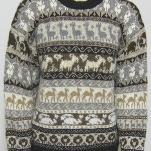 May include: A brown, grey, and white patterned sweater with a crew neck. The sweater features a repeating pattern of animals, including deer, llamas, and sheep.