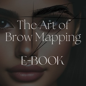 May include: Image of a woman's face with the text "The Art of Brow Mapping E-BOOK". The image has a dark, neutral background. The text is in a serif font. The image also features lines drawn over the eyebrows.
