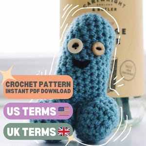 May include: Crochet pattern for a blue amigurumi character with googly eyes and a smiling mouth. The pattern is available as an instant PDF download in US or UK terms.