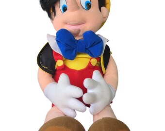 Contenitore segreto a forma di Pinocchio in peluche, ideale per nascondere denaro, gioielli ed erbe aromatiche.