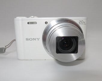 SONY Cyber-Shot DSC-WX300 Compact Digital Camera WiFi 18.2mp 20x optical Full-HD, 32GB sd card, battery, charger, Tested and Works Excellent