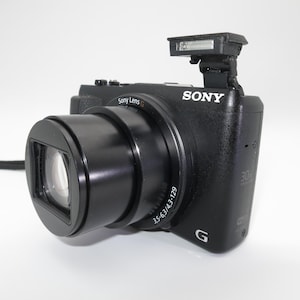 Sony Cyber-Shot DSC HX60 30x Optical Zoom Full-HD Compact Digital Camera + 32gb sd card, Mint condition, Tested and works excellent