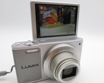 Panasonic LUMIX DMC-SZ10 16.0MP Compact Digital Camera with 12x Leica lense, Flip Screen a cult classic excellent condition Tested and Works