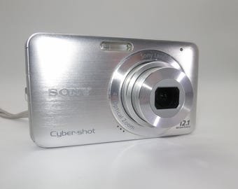 Sony Cyber-shot DSC-W310 12.1MP Compact Digital Camera silver color, SD card, USB charger, battery, Tested and Works Excellent