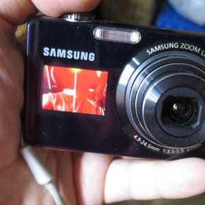 May include: A rustic wooden sign with the text "Welcome to our home" in white lettering. The sign features a distressed finish and a simple, inviting design, perfect for a front porch or entryway.