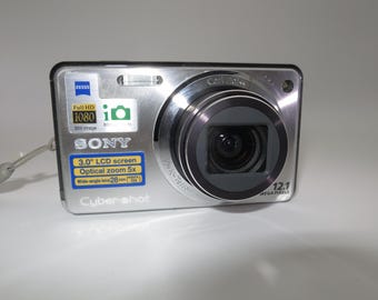 Sony CyberShot DSC-W290 12.1 MP 5x Optical Zoom Digital Camera silver with original charger, battery, memory card, Tested and Works