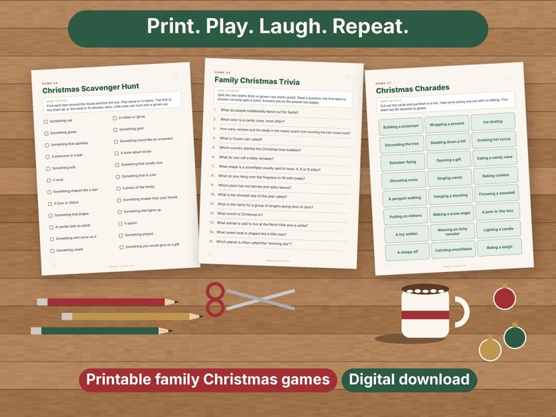 May include: Three printable game sheets titled Christmas Scavenger Hunt, Family Christmas Trivia, and Christmas Charades. Includes red, yellow, and green pencils, scissors, a mug, and three round ornaments on a wood-grain background.