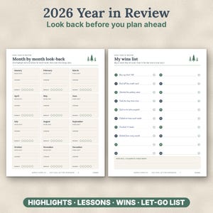 May include: Two pages of a 2026 Year in Review goal setting workbook. The left page features a month-by-month look-back with sections for highlights, lessons, and energy dots. The right page lists wins with numbered lines and star icons.