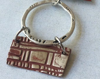 Fine silver rectangle pendant with vintage red tin and hammered silver ring