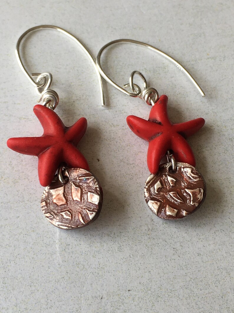 Fine silver disc earrings with red howlite starfish charms,Cinnabar patina fine silver earrings
