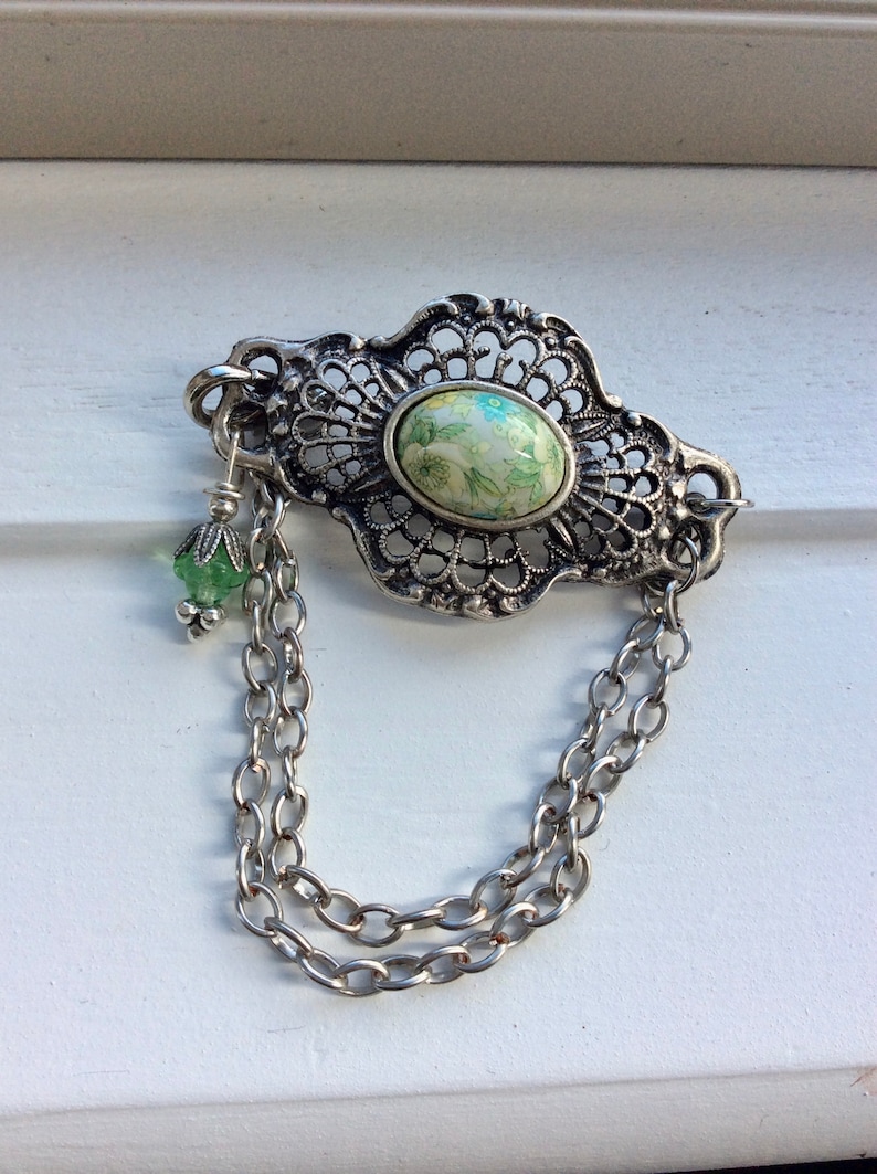 Antique silver filigree bracelet with floral Japanese porcelain centre
