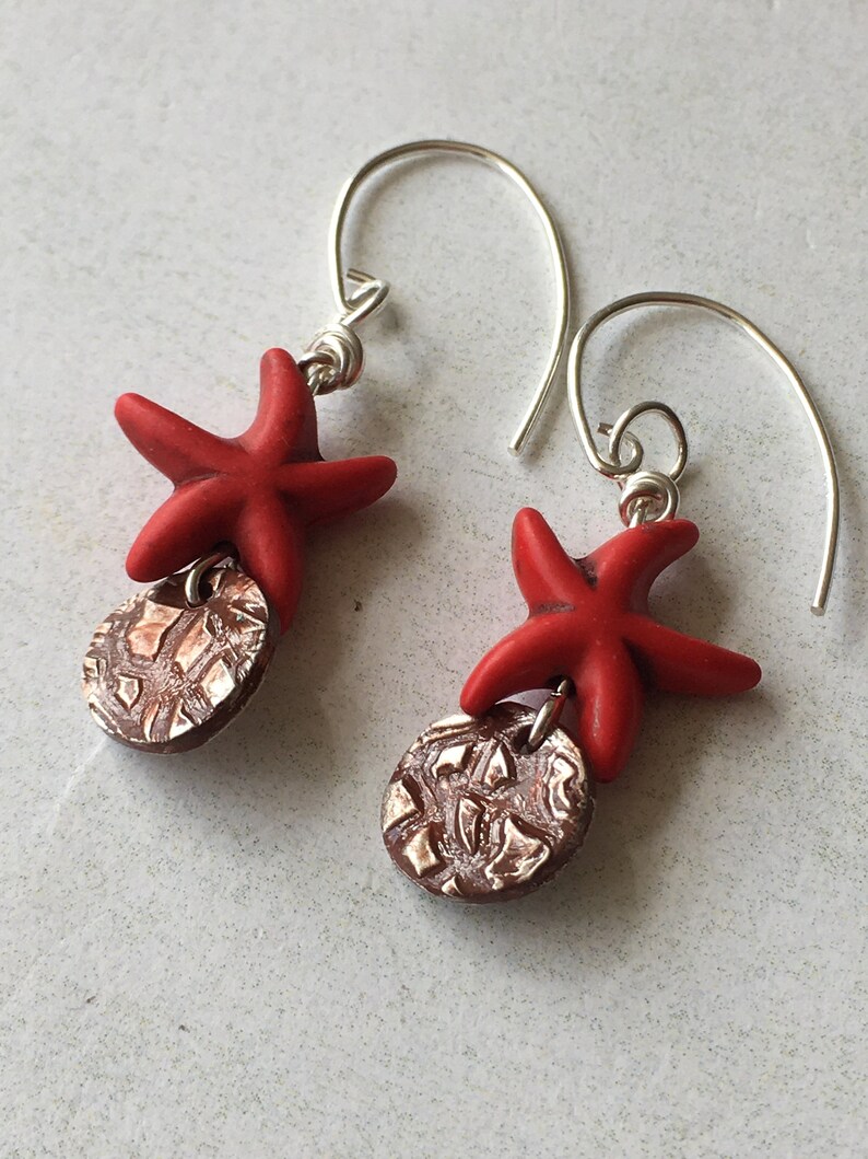 Fine silver disc earrings with red howlite starfish charms,Cinnabar patina fine silver earrings