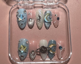 Xavier Love and Deepspace inspired blue and white space star and moon press on nails
