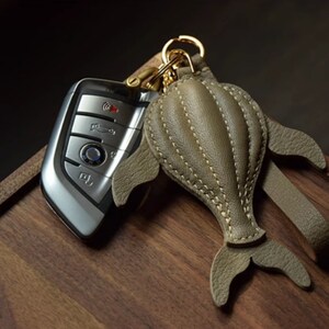Personnalisation à la main artisanat en cuir pendentif baleine clé de voiture sac décoration sac pendentif cadeau personnalisé à la main