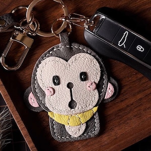 Petit singe porte-clés cartable pendentif personnalisation pur fait main voiture porte-clés sac pendentif artisanat en cuir fait main
