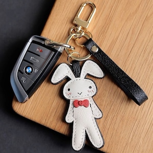 Kaninchen-Puppe Keychain Schul-Anhänger Anpassung Reines handgemachtes Auto Keychain Taschen-Anhänger-handgemachtes Leder-Handwerk