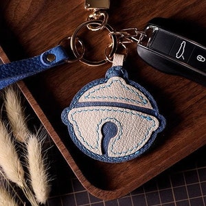 Petite cloche porte-clés cartable pendentif personnalisation pur porte-clés de voiture fait main sac pendentif artisanat en cuir fait main