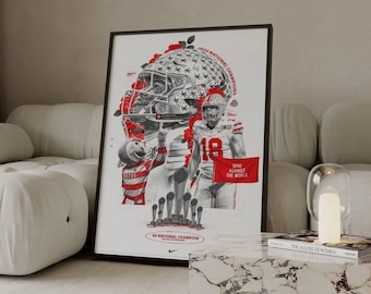 May include: Framed poster featuring a red and white graphic of a football player and helmet. The poster includes the text "2024 NATIONAL CHAMPIONS" and "OHIO AGAINST THE WORLD". The poster is displayed on a white wall.