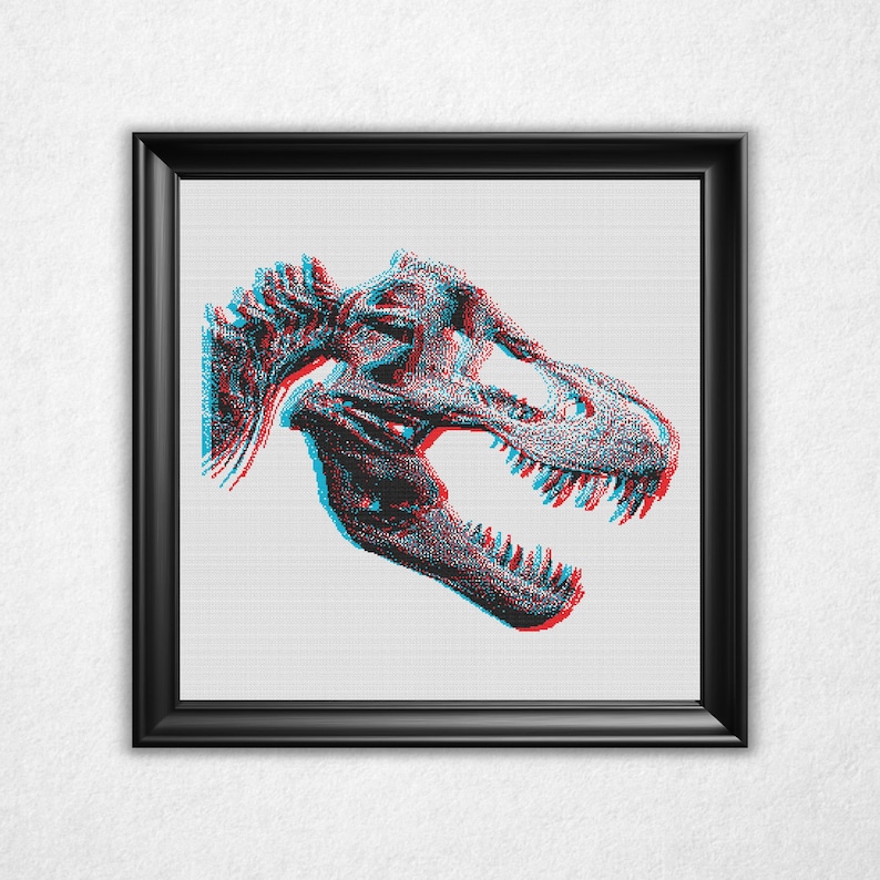 Digital rendering of a cross stitch on white aida cloth in a black frame of a bitmap style Tyrannosaurus rex, or t-rex, dinosaur skull in an anaglyph 3d style with cyan on the left and red on the right and offset vertically by a few stitches.