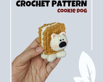 May include: Crochet pattern for a cookie dog amigurumi. The dog is made to look like a cookie sandwich with brown and white yarn. The pattern is labeled "Easy".